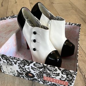 Size 8 Bordello platform stilettos. White with black patent and buttons